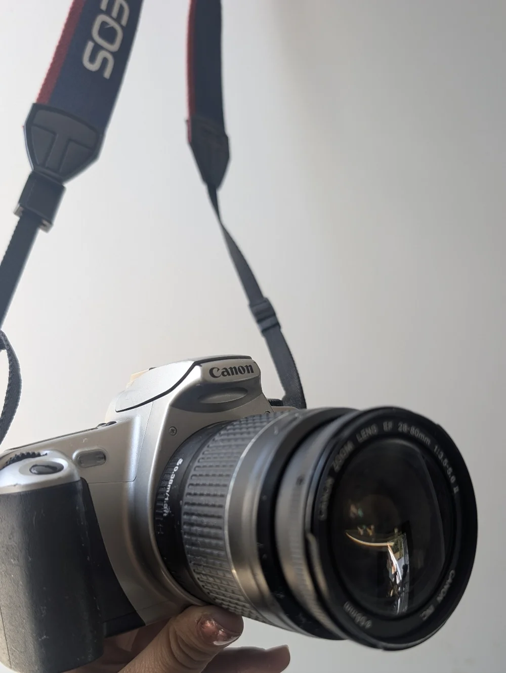 Vintage Canon Silver and Black Camera with Zoom Lens